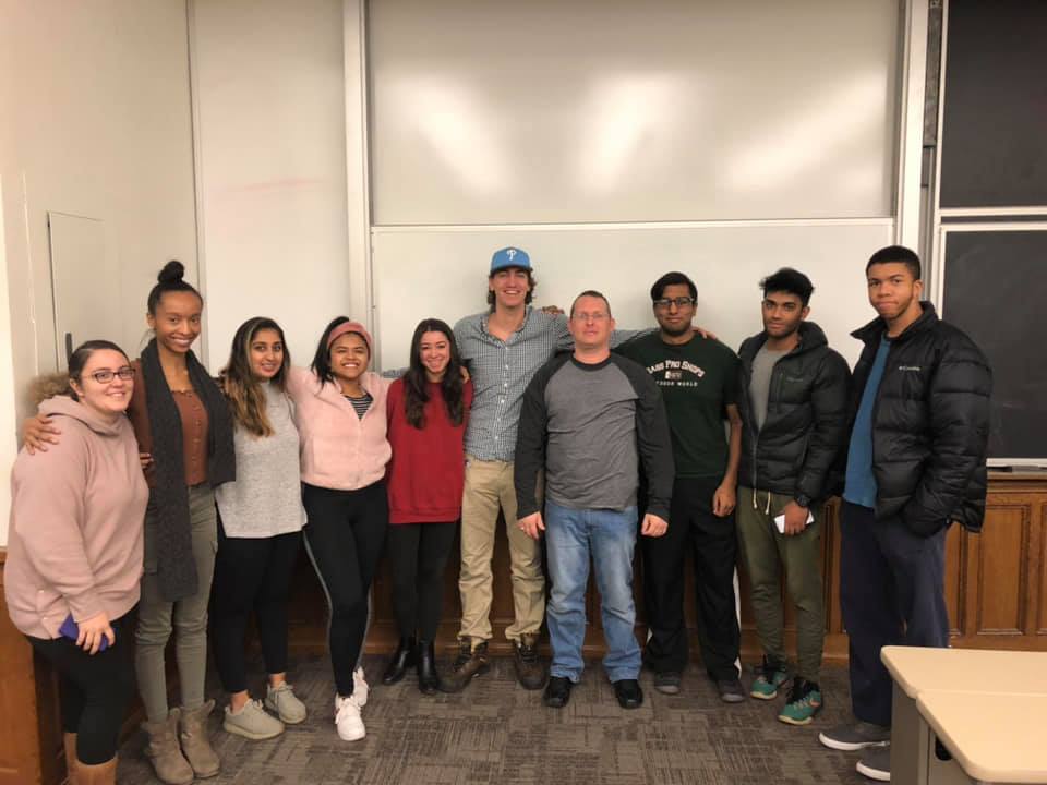 Dr. Sabol with a group of students after class